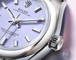 Gros plan sur le cadran <i>lavender</i>, Oyster Perpetual 28, acier Oystersteel