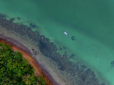 The Marine Conservation Cambodia team use a drone to survey the waters of the Kep Archipelago from above, which helps them to locate and monitor seagrass meadows.