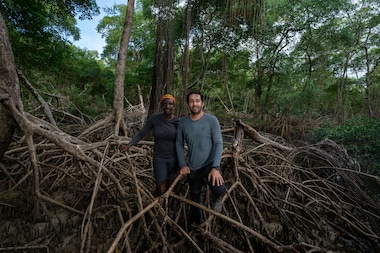 National Geographic Explorers Margaret Owuor and Angelo Bernardino in the mangrove forest that neighbours Muriá river, Pará, Brazil. Owuor and Bernardino are working with communities at the mouth of the Amazon to map the ecosystem services provided by the mangroves and determine their economic value.