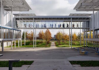 A six-metre-high bridge connects the two main tubes of the CERN Science Gateway building. The bridge symbolises the inseparable link between science and society, with sustainability at its core.