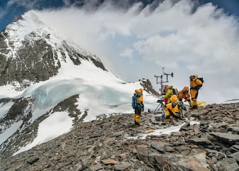 Climate scientists Baker Perry, Tom Matthews and a team of Sherpa guides build an automated weather station on the South Col on Mount Everest at 7,945 meters as part of the National Geographic and Rolex Perpetual Planet Everest Expedition.