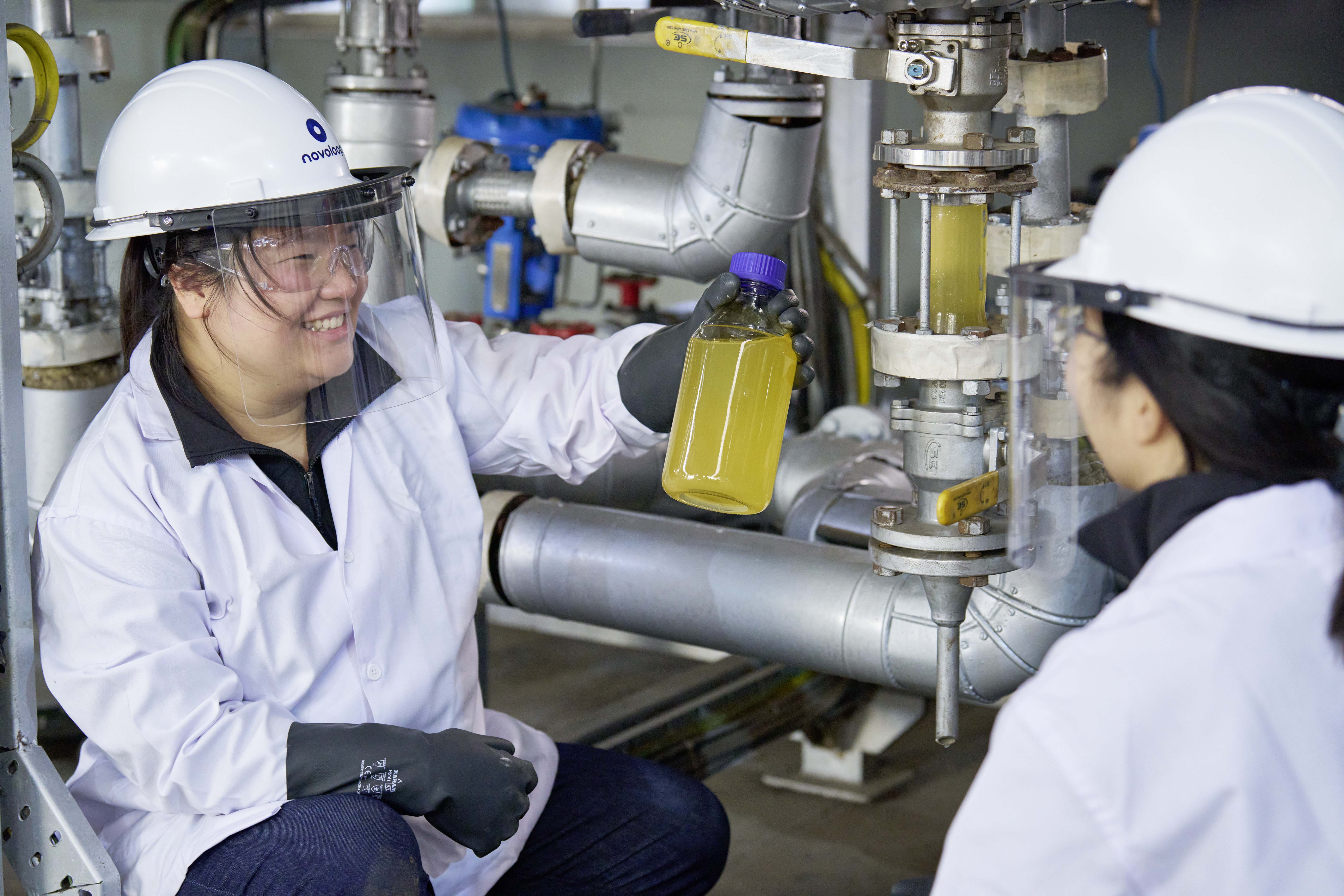 Miranda Wang (left) and Jeanny Yao (right), pictured smiling as the first successful batch of monomers is extracted at the demo pilot plant. The pair have spent years inventing a chemical process to turn unwanted plastics into high-quality materials that could be used to displace fossilderived plastics across the globe.