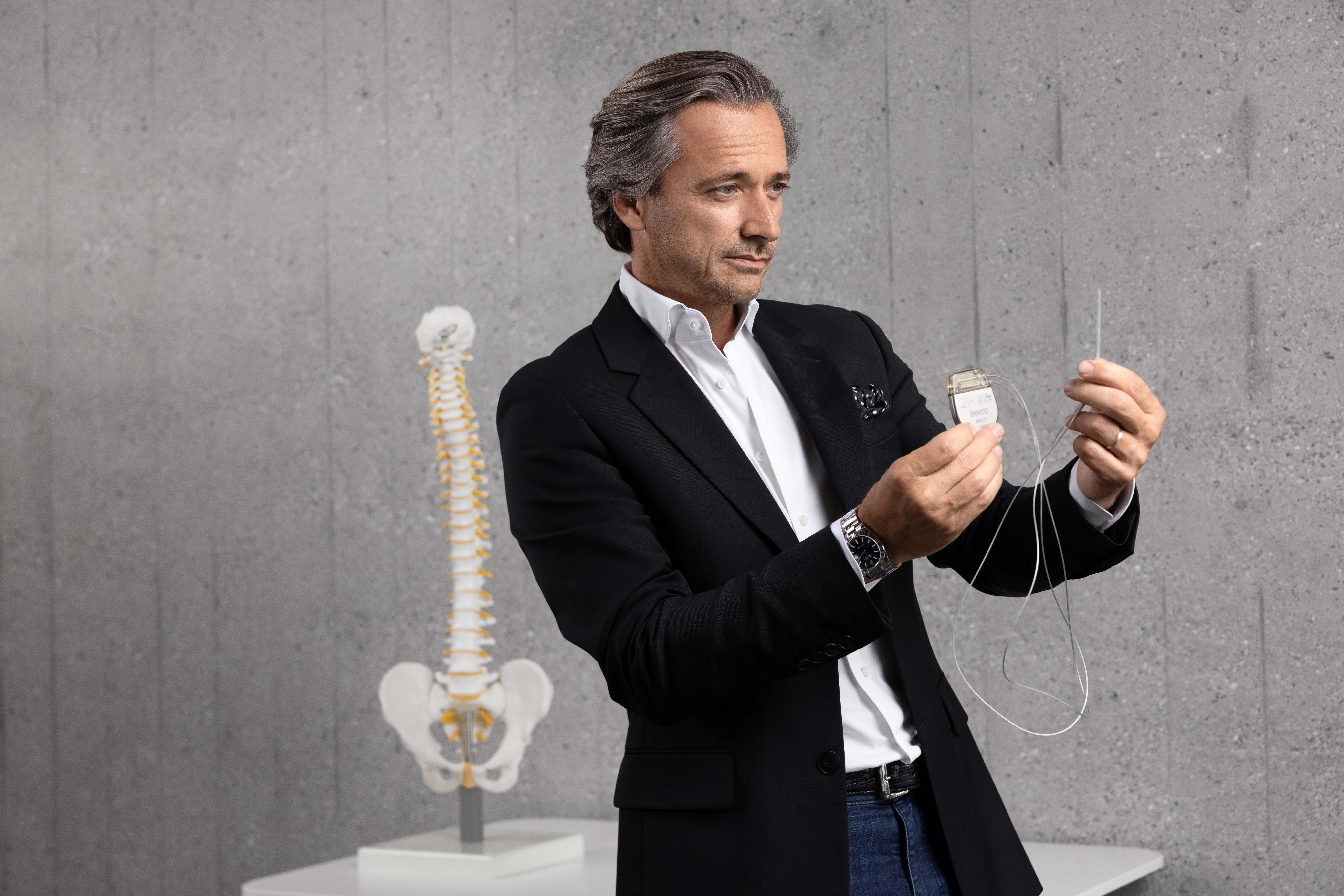 Neuroscientist Grégoire Courtine, pictured with the brain implant which is transforming the lives of patients. Courtine founded .NeuroRestore in 2018 and began working closely with neurosurgeon Jocelyne Bloch, developing a revolutionary system for patients with severe spinal cord injuries to regain control over their legs.