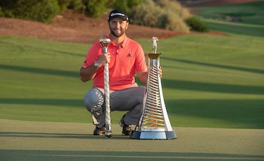 ROLEX TESTIMONEE JON RAHM POSES WITH THE 2019 DP WORLD TOUR CHAMPIONSHIP AND RACE TO DUBAI TROPHIES