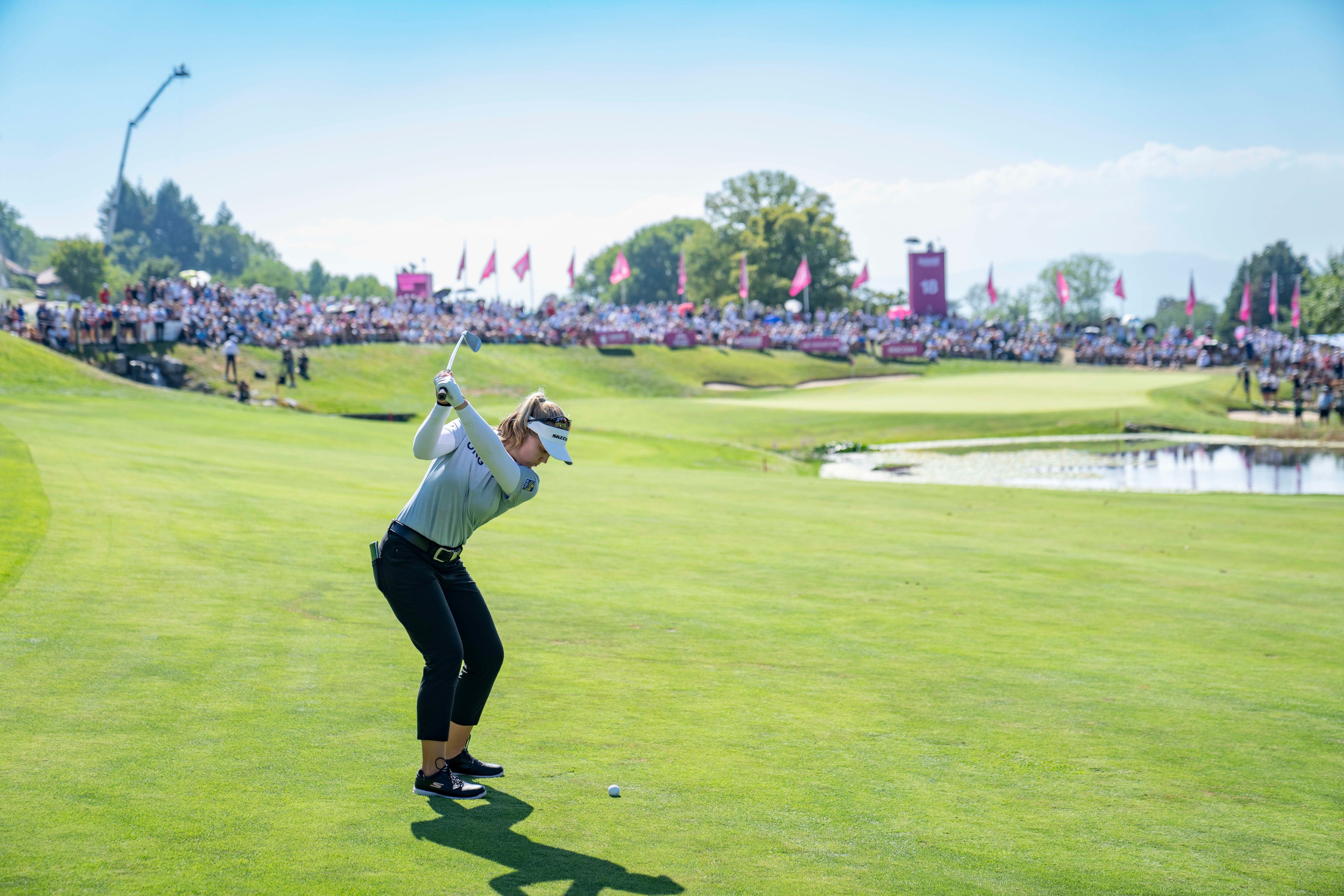 ROLEX TESTIMONEE BROOKE HENDERSON PLAYS AN IRON APPROACH TO THE 18TH GREEN DURING THE 2022 AMUNDI EVIAN CHAMPIONSHIP