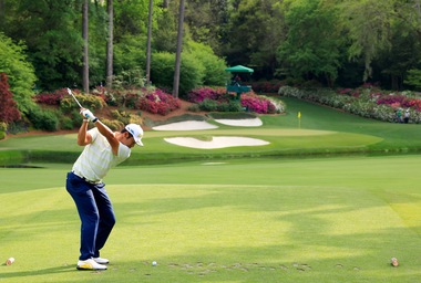 ROLEX TESTIMONEE HIDEKI MATSUYAMA PLAYS A STROKE FROM THE NO. 12 TEE DURING THE FINAL ROUND AT THE 85TH MASTERS