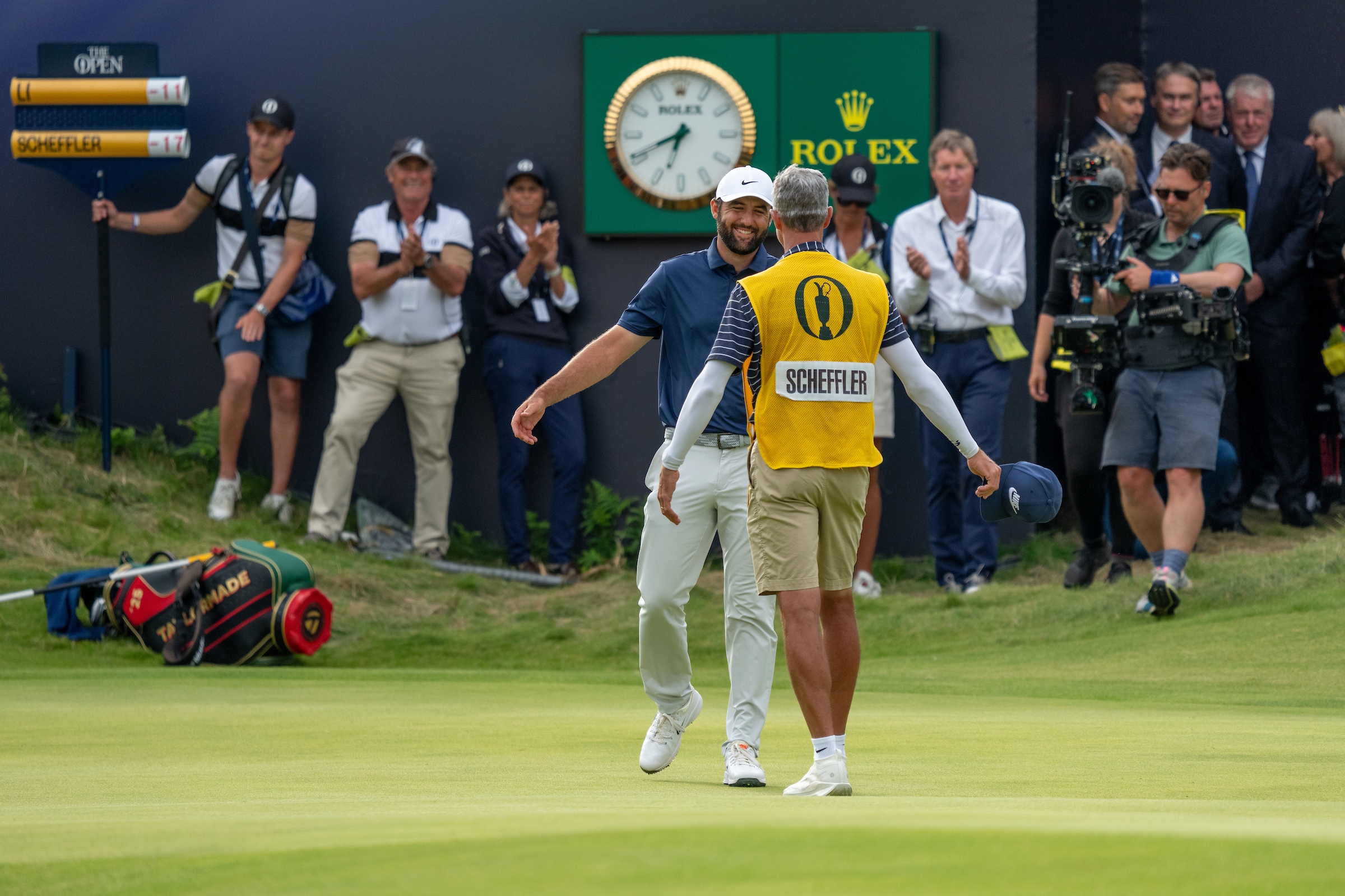 ROLEX TESTIMONEE SCOTTIE SCHEFFLER EMBRACES HIS CADDIE AFTER WINNING THE OPEN 2025