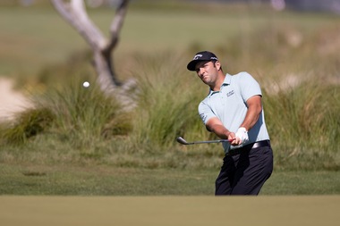 ROLEX TESTIMONEE JON RAHM PLAYING  A CHIP SHOT DURING THE FIRST ROUND  AT THE 103RD PGA CHAMPIONSHIP