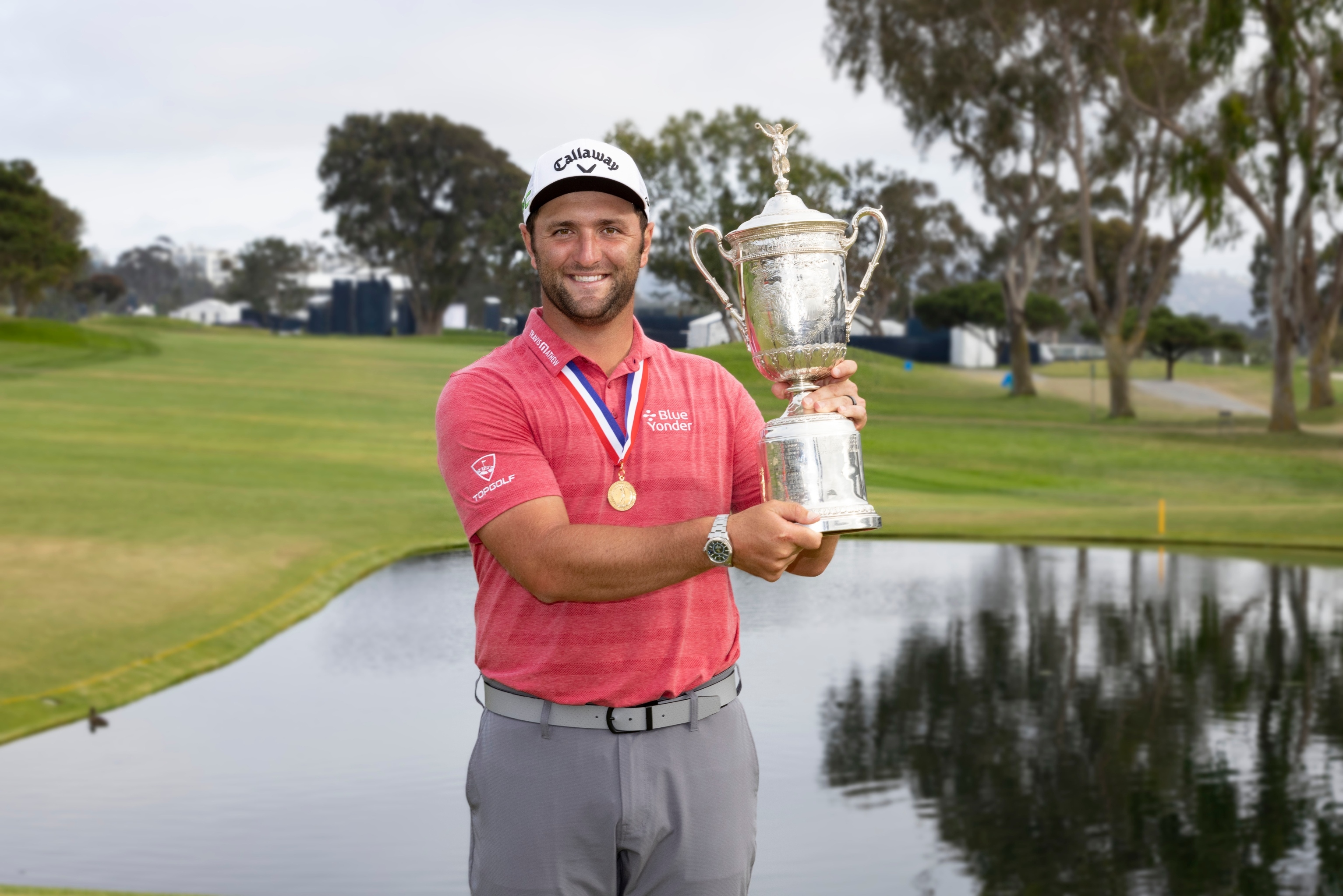 ROLEX TESTIMONEE JON RAHM LIFTS THE U.S. OPEN CHAMPIONSHIP TROPHY AT THE 121ST EDITION OF THE U.S. OPEN, 2021