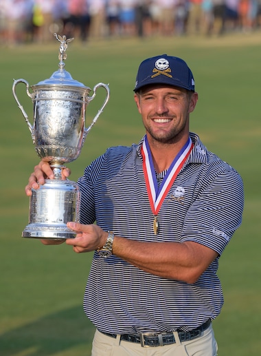 ROLEX TESTIMONEE BRYSON DECHAMBEAU WITH THE U.S. OPEN TROPHY AND THE JACK NICKLAUS MEDAL AFTER WINNING THE 2024 U.S. OPEN
