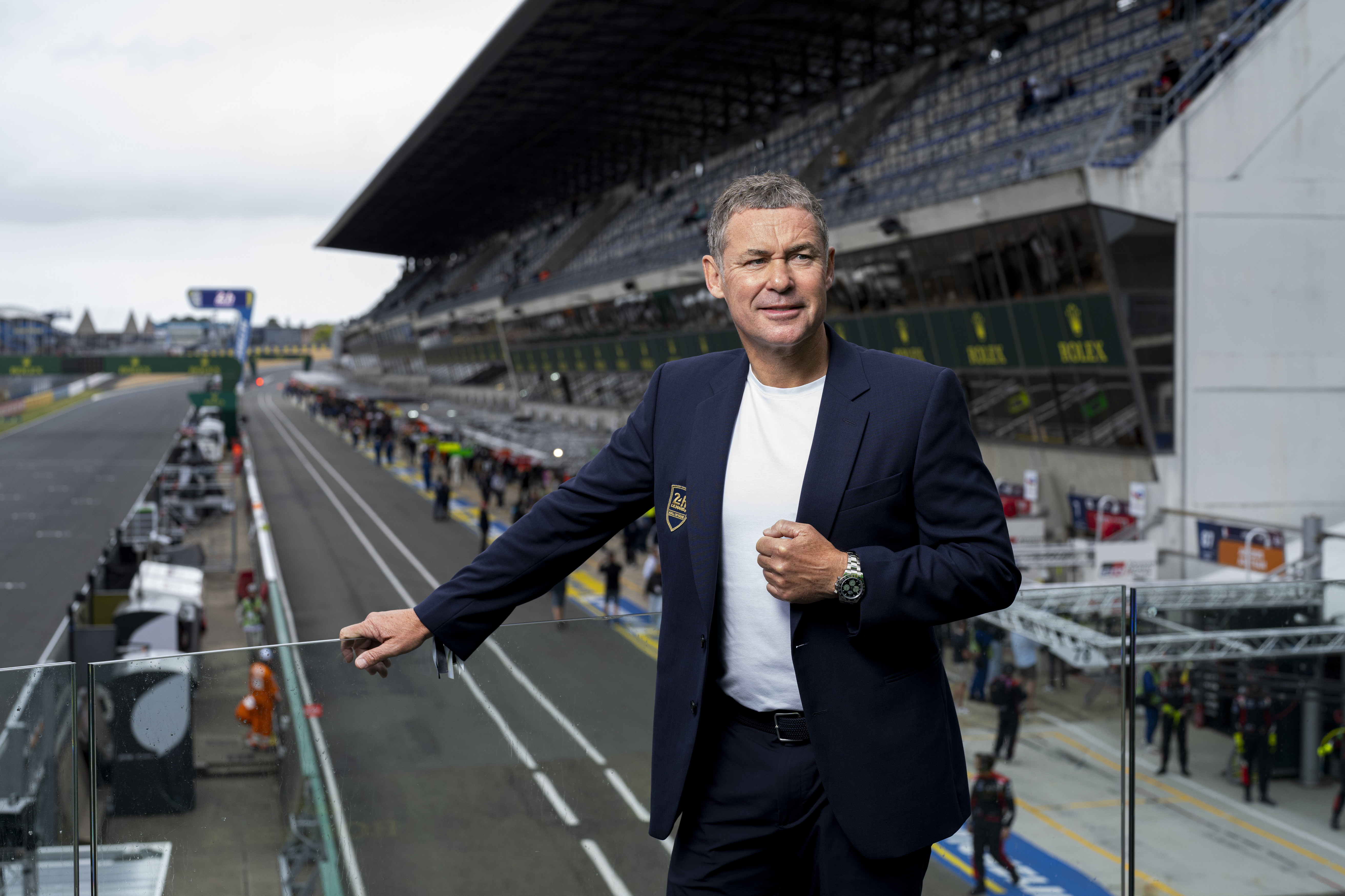 ROLEX TESTIMONEE TOM KRISTENSEN STANDING ON THE NEW 24 HOURS OF LE MANS PODIUM