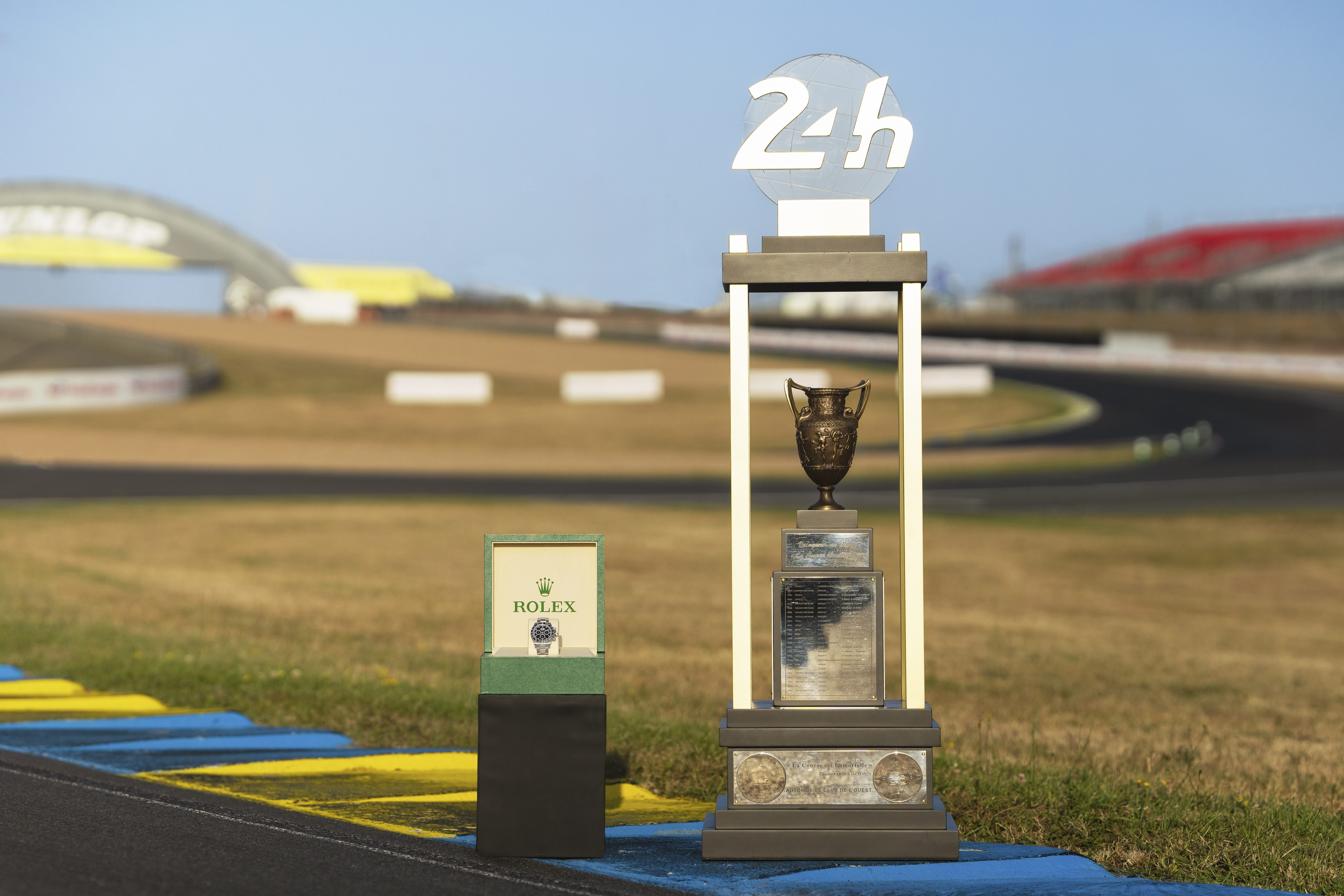 24 HOURS OF LE MANS 2025 TROPHY AND THE ENGRAVED ROLEX OYSTER PERPETUAL COSMOGRAPH DAYTONA PRESENTED TO THE WINNERS