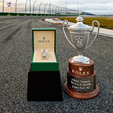 THE 2023 ROLEX 24 AT DAYTONA TROPHY AND THE ENGRAVED ROLEX OYSTER PERPETUAL COSMOGRAPH DAYTONA PRESENTED TO THE WINNERS OF THE RACE AT THE LE MANS CHICANE