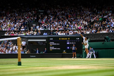 ROLEX TESTIMONEE AND LAVER CUP DEBUTANT CARLOS ALCARAZ SERVES AT THE CHAMPIONSHIPS, WIMBLEDON, 2024
