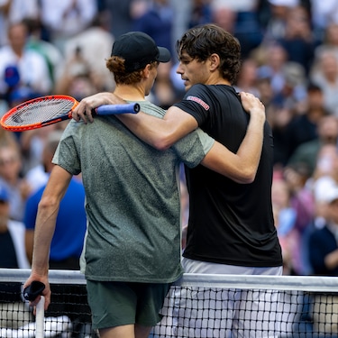 ROLEX TESTIMONEES JANNIK SINNER AND TAYLOR FRITZ SHARE A MOMENT AT THE NET AFTER THE FINAL